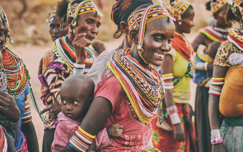 Group of people smiling together in nature