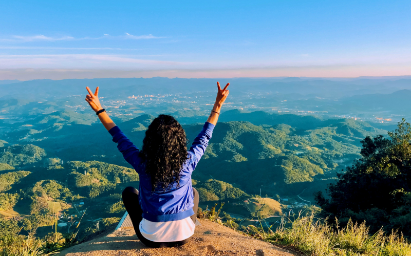 Happy woman with beautiful view of nature